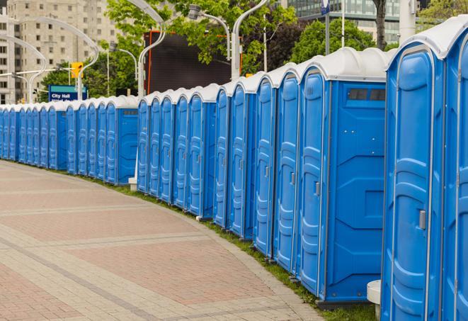 a row of portable restrooms at a fairground, offering visitors a clean and hassle-free experience in thompsonsstation